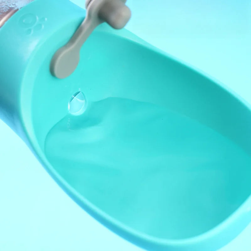 pettechhair portable pet water bottle with attached turquoise travel bowl and flow stop button