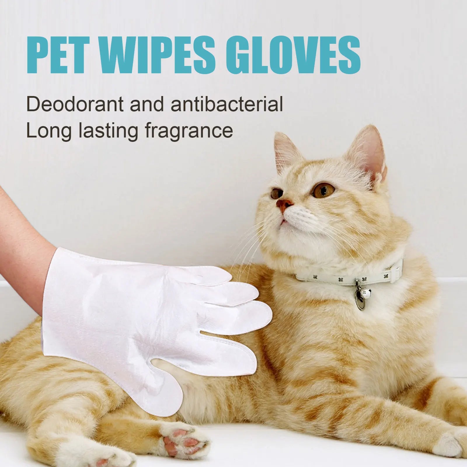 Pet Wipes Gloves being used to gently clean a relaxed orange tabby cat deodorant antibacterial