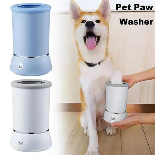 Pet Paw Washer compact electric paw cleaner in white and blue shown next to happy dog being cleaned by hand