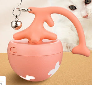 Cat playing with coral pink smart interactive cat toy ball with bell – USB rechargeable