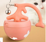 Cat playing with coral pink smart interactive cat toy ball with bell – USB rechargeable