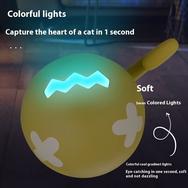 pettechhair cat LED toy ball with soft yellow silicone body and colorful gradient lights for interactive play